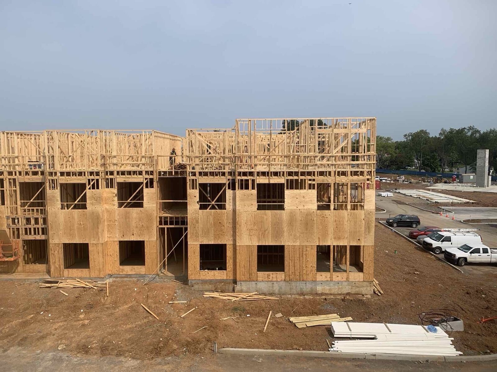 Multi-family building row with wall framing underway